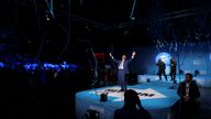 Nigel Farage reacts while speaking on stage during a rally at the NEC.
Pic: Reuters
