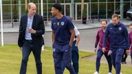 The Prince of Wales speaks with England player Ollie Watkins during a visit to St George's Park, in Burton upon Trent, Staffordshire, to meet with the England men's football team ahead of the UEFA Euro 2024 campaign. Picture date: Monday June 10, 2024.
