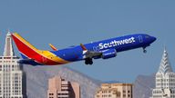 A Boeing 737 MAX 8 (737-8 MAX, registration N8854Q) jetliner, belonging to Southwest Airlines, passes casino hotels on the Las Vegas Strip. Pic: AP