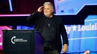Steve Bannon salutes as he attends an event in June. Pic: Reuters