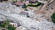 Aerial view of the area affected by the landslide with the houses in the hamlet of Sorte engulfed by stones in Lostallo, Southern Switzerland, after a landslide, caused by the bad weather and heavy rain in the Misox valley, Saturday, June 22 2024. Massive thunderstorms and rainfall led to a flooding situation on Friday evening after a landslide in the Misox valley. Four people went missing on Saturday morning. Several dozen people had to be evacuated from their homes in the Misox and Calanca reg