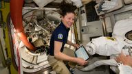 NASA astronaut Tracy C Dyson prepares a spacesuit ahead of the spacewalk. Pic: NASA Johnson