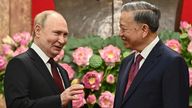 Vladimir Putin speaks with To Lam
Pic: AP