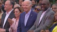 Biden freezes during holiday celebrations at the White House