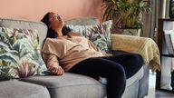 Shot of a young woman resting on the sofa at home. Pic: iStock