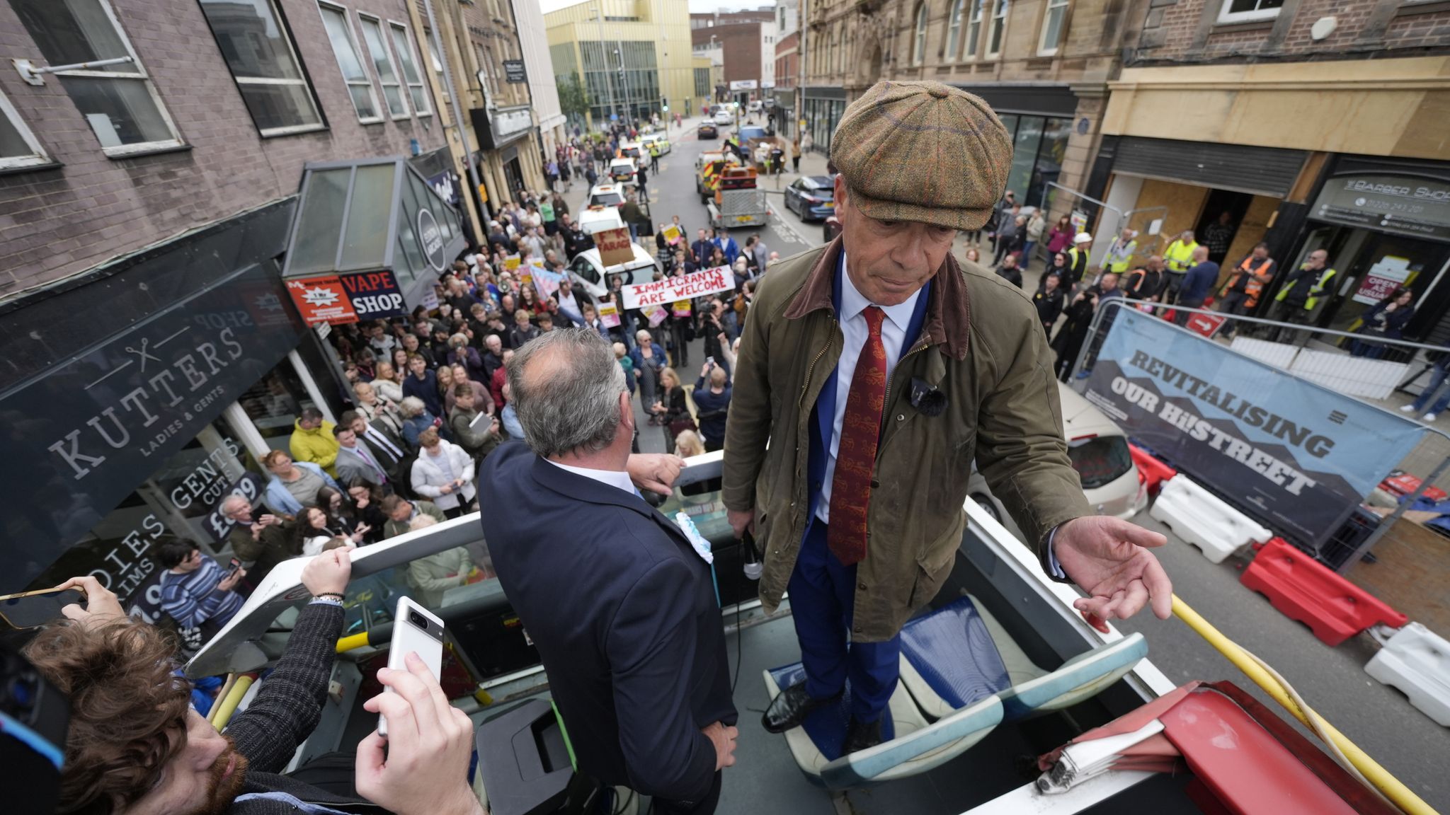 Nigel Farage: Man arrested after objects thrown at Reform leader during ...