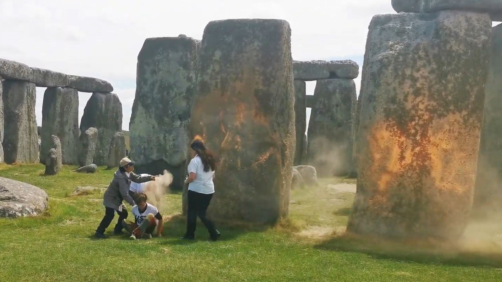 Just Stop Oil activists arrested after Stonehenge sprayed with 'orange(02)