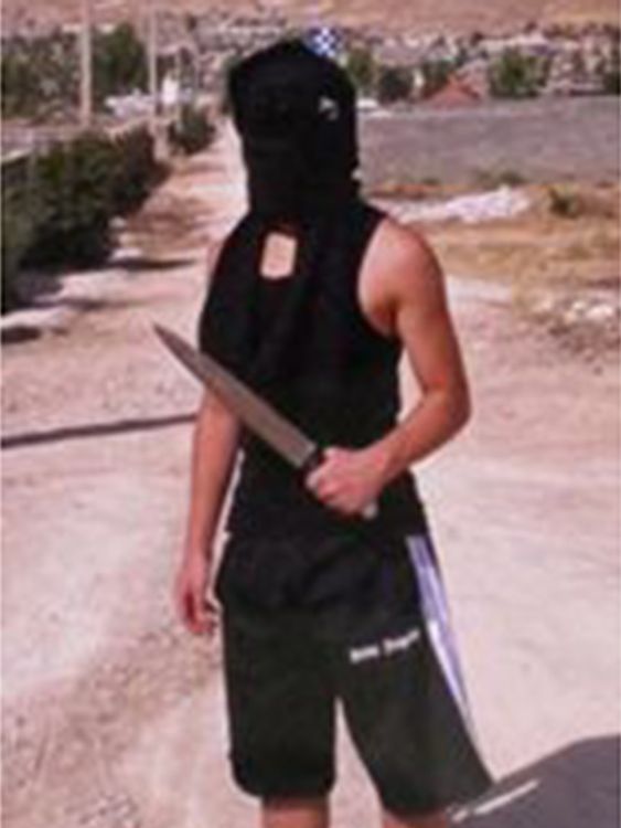 A picture recovered from the phone of Bardia Shojaeifard shows him posing with a knife.
Pic: West Yorkshire Police
