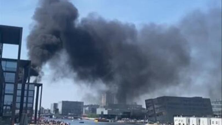 Smoke billows across Copenhagen Harbour