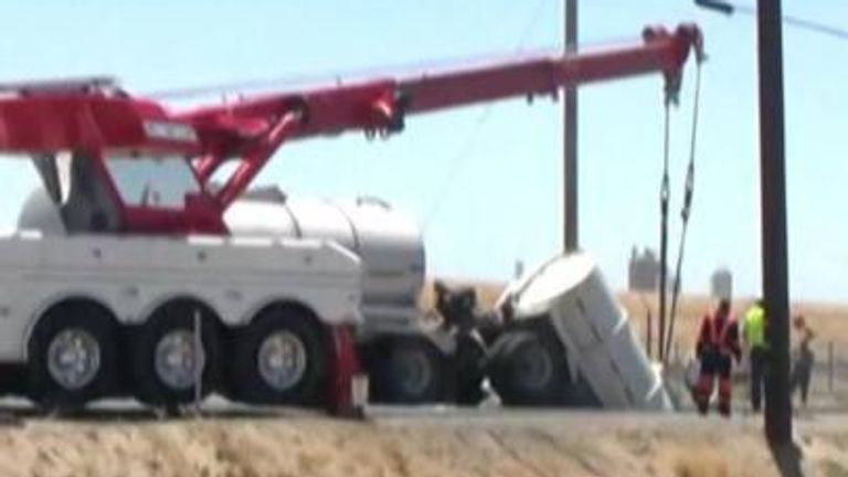 Sinkhole swallows trailer of truck after sewer line breaks for the second time in one week.