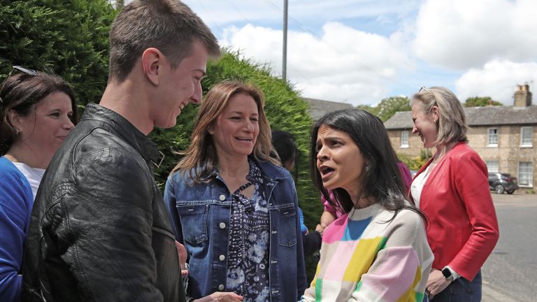 Akshata Murty speaking to a local resident in Fordham