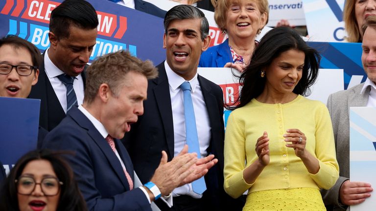 Rishi Sunak and Akshata Murty arrive at an event to launch the Conservative Party's manifesto.
Pic: Reuters