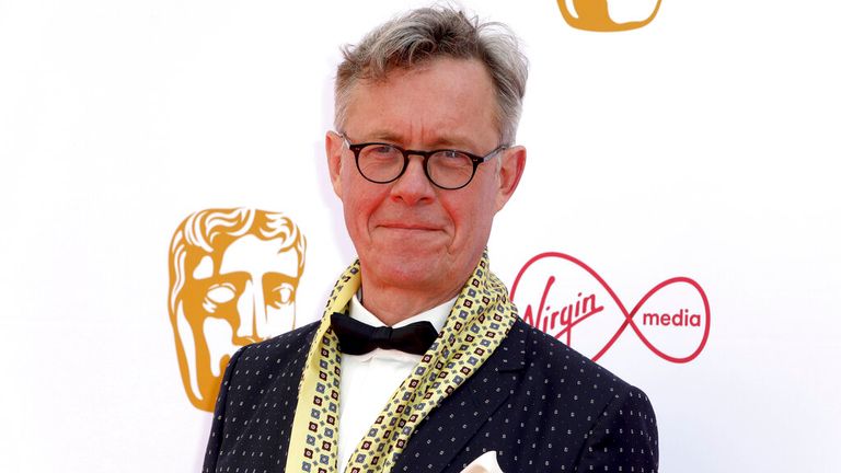 Actor Alex Jennings poses for photographers on arrival at the 2019 BAFTA Television Awards in London, Sunday, May 12, 2019.(Photo by Grant Pollard/Invision/AP)