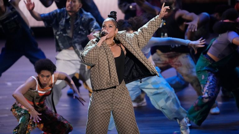 Alicia Keys performs alongside members of the company of "Hell's Kitchen" during the 77th Tony Awards on Sunday, June 16, 2024, in New York. (Photo by Charles Sykes/Invision/AP)