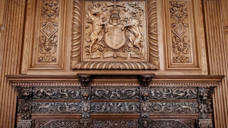 A fireplace flanked by warriors bearing an oak mantel, this is the only item in the castle that was retrieved from the original castle and which dates back to the 1830's. Pic: PA