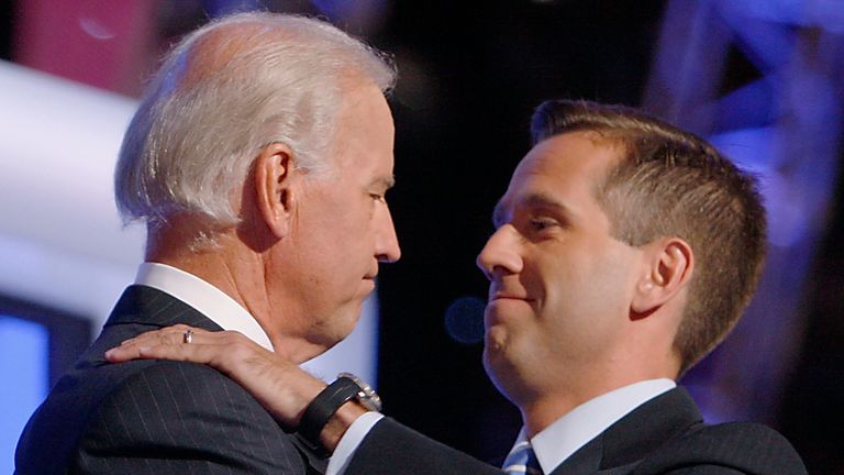 FILE - Then-Democratic vice presidential candidate Sen. Joe Biden, D-Del., left, embraces his son Beau Biden on stage at the Democratic National Convention in Denver, Aug. 27, 2008. (AP Photo/Charles Dharapak, File)