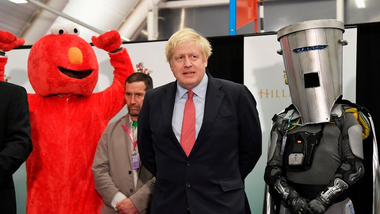 Boris Johnson alongside Elmo and Count Binface in 2019. Pic: Reuters