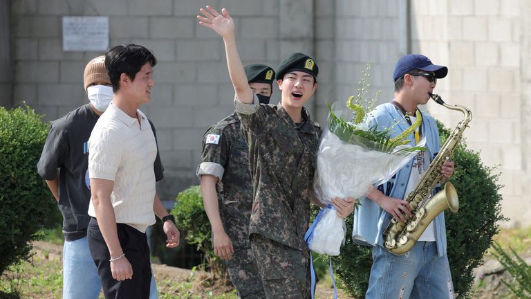 K-pop boy band BTS member Jin leaves after being discharged from the military in Yeoncheon, South Korea.
Pic: Yonhap /Reuters