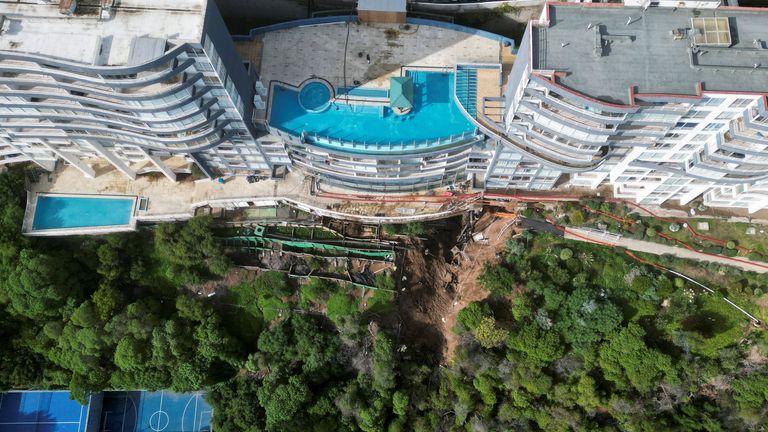 A drone view shows a massive landslide next to a building complex after heavy rains hit in Vina del Mar, Chile.
Pic: Reuters