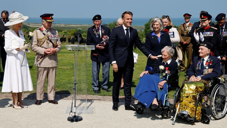French President Emmanuel Macron reacts after awarding 104-year-old British Second World War veteran Christian Lamb, who helped plan the D-Day landings in Normandy, with the insignia of Knight of the order of the Legion of Honor.  Photo: Reuters