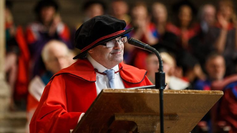 Dr Mark Brookes receiving an honorary doctorate in law from the University of Kent 
