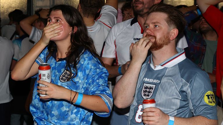 It was a tense second half for fans in Dalston, east London.  Photo: Reuters