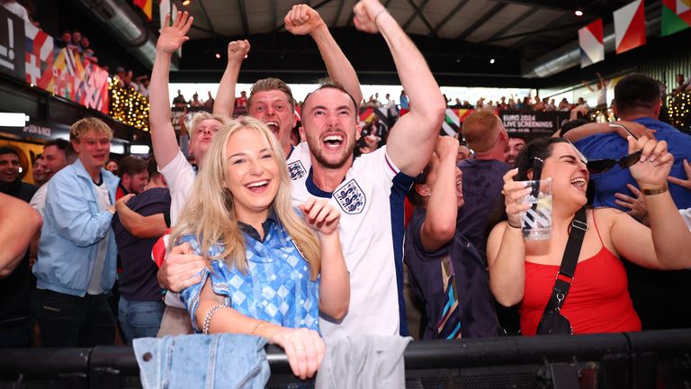Fans celebrate the first goal at Wembley's BoxPark. Pic: Reuters
