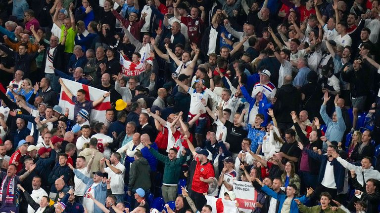 England fans celebrate at the end of the Group C match between Serbia and England. Pic: AP
