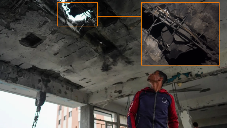 Sky News matched a hole in the roof to a video filmed at night showing a weapon fragment. Pic: Bashar Taleb/ AFP