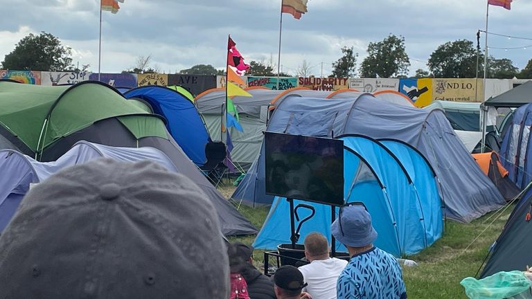 One Direction star Louis Tomlinson took a TV to Glastonbury to watch the England v Slovakia game