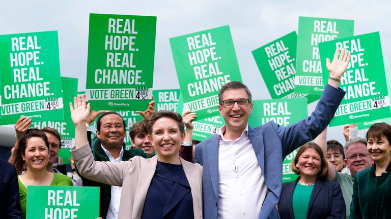 Green Party co-leaders Adrian Ramsay and Carla Denyer pose with supporters at their General Election Manifesto launch.
Pic: AP