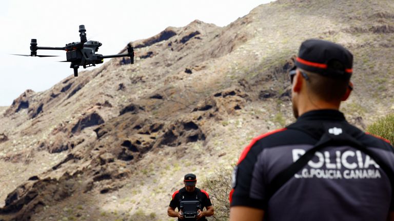 Canarian police officers carry out a drone search for the young British man Jay Slater in the Los Carrizales ravine, on the island of Tenerife, Spain, June 26, 2024. REUTERS/Borja Suarez