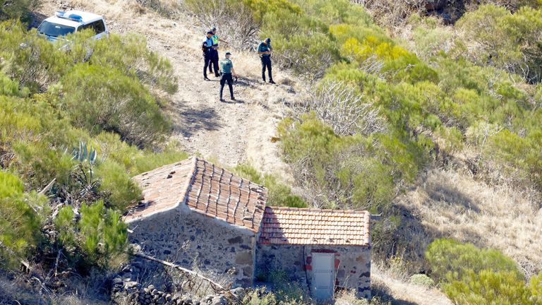 Police officers search for a missing  Masca ravine on the island of Tenerife.
Pic: Reuters