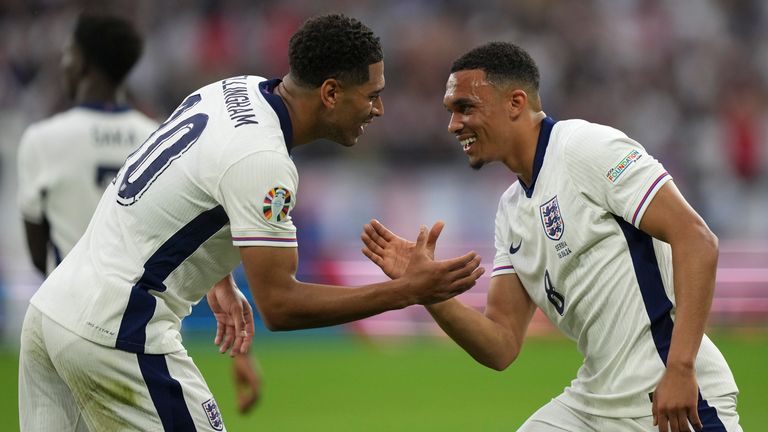 Jude Bellingham and Trent Alexander-Arnold celebrate after the Real Madrid star's goal for England.  Photo: AP