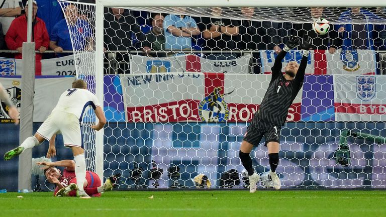 Kane had a header saved and pushed on to the bar. Pic: AP