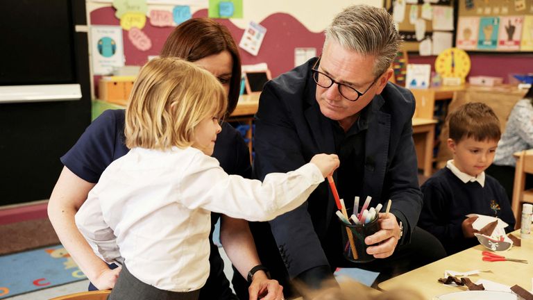 Keir Starmer and Bridget Phillipson play with children as they visit a nursery during a Labour general election campaign event, in Nuneaton, Britain, June 10, 2024. REUTERS/Phil Noble