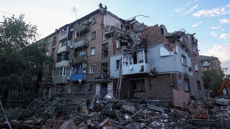 A residential building hit by a Russian missile in Kharkiv on Friday. Pic: Reuters