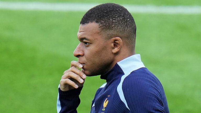 France's Kylian Mbappe gestures during a training session in Paderborn, Germany, Thursday, June 13, 2024. Mbappe was absent when the squad took part in an open practice session at its European Championship base on Thursday. France will play against Austria during their Group D soccer match at the Euro 2024 soccer tournament on June 17. (AP Photo/Hassan Ammar)