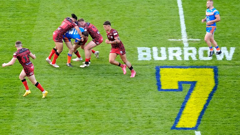 A general view of the action next to a large number 7 in tribute to former Leeds Rhinos player Rob Burrow during the Betfred Super League match at AMT Headingley Stadium, Leeds.  Photo date: Friday, June 21, 2024. Photo: PA