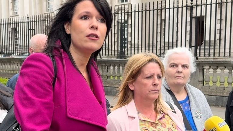 Grainne Teggart of Amnesty International (left) with Martina Dillon whose husband was murdered (right)
