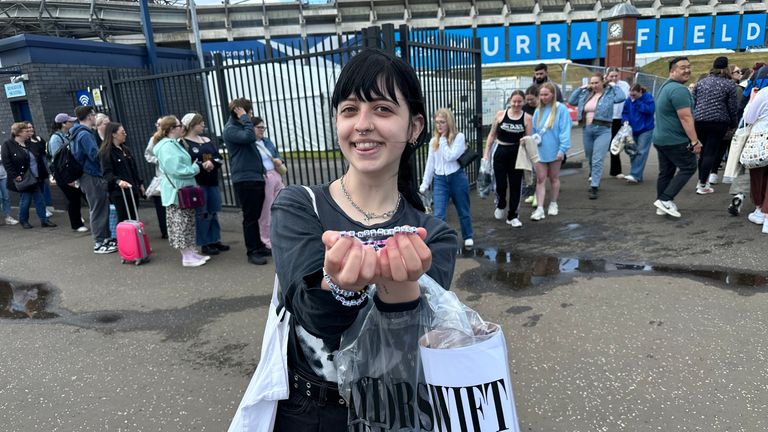 Lucy Clark was handing out friendship bracelets outside Murrayfield. Pic: Sky News
