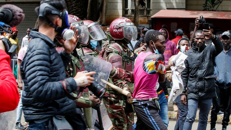 Police members detain a protester at a demonstration over police killings of people protesting against Kenya's proposed finance bill 2024/2025, in Nairobi, Kenya, June 27, 2024. REUTERS/Monicah Mwangi