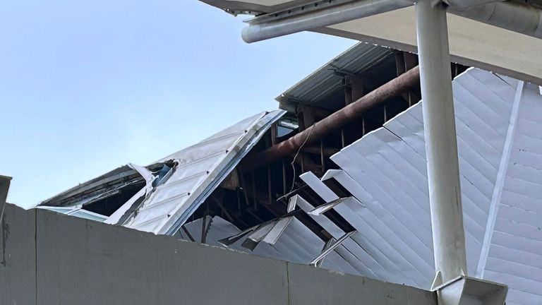 A view of the damage to a part of a departure terminal canopy at New Delhi...s Indira Gandhi International Airport that collapsed in heavy pre-monsoon rains in New Delhi, India, Friday, June 28, 2024. (AP Photo/Shonal Ganguly)