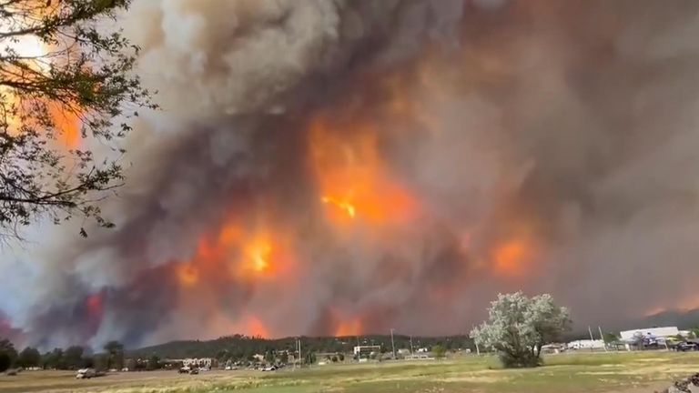 New Mexico: Whole village evacuated as wildfires spread - at least one ...