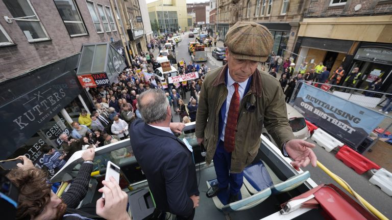 Nigel Farage makes a speech on the Reform UK campaign bus in Barnsley.
Pic: PA