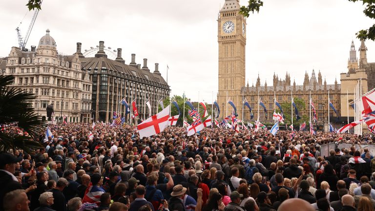 People take part in a protest march through London to Parliament Square, organised by Tommy Robinson, whose real name is Stephen Yaxley Lennon. Groups from across the UK linked to football disorder are expected to attend the event the Metropolitan Police said. Picture date: Saturday June 1, 2024.