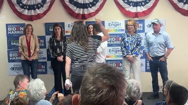 Pro-Palestinian protesters interrupt the opening of a Democratic Party office in Tuscon, Arizona.