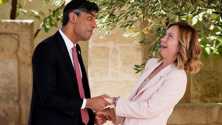 Prime Minister Rishi Sunak is greeted by Italian Prime Minister Giorgia Meloni during a welcome ceremony at the G7 leaders' summit at the Borgo Egnazia resort, in Puglia, Apulia, Italy. Picture date: Thursday June 13, 2024.

