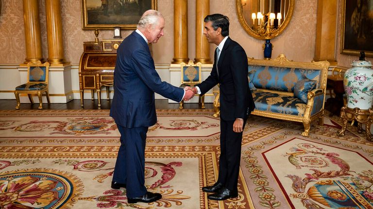 King Charles III welcomes Rishi Sunak during an audience at Buckingham Palace, London, where he invited the newly elected leader of the Conservative Party to become Prime Minister and form a new government, Tuesday, Oct. 25, 2022. (Aaron Chown/Pool photo via AP)