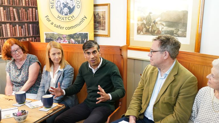 Rishi Sunak attends a neighborhood watch meeting at the Dog & Bacon pub in Horsham, West Sussex.. Photo: PA